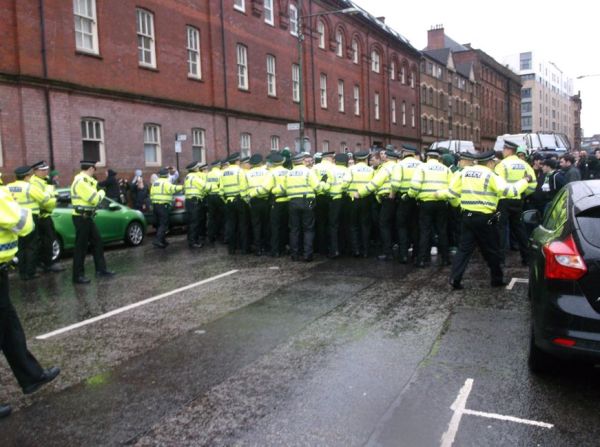A police line attempts to stop the march minutes after it begins (Picture courtesy of TCN)