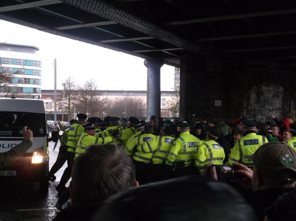 Marchers broke through the attempted police blockade underneath the bridge at Bell Street (Picture courtesy of TCN)